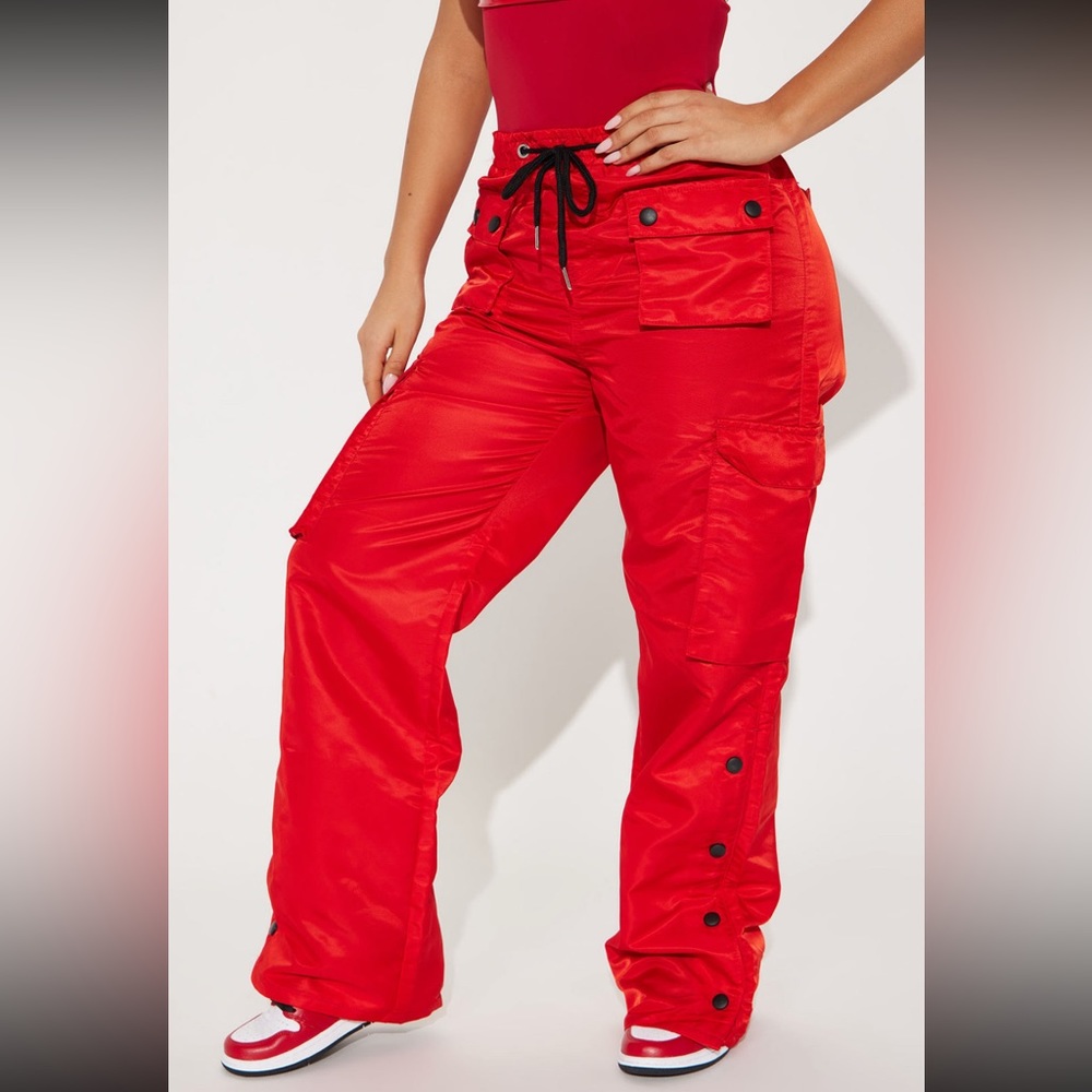 Red jogger pants.